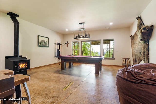 17378 N Freddi Rd, Rathdrum, ID 83858 - game room with baseboards, billiards table, recessed lighting, and a wood stove