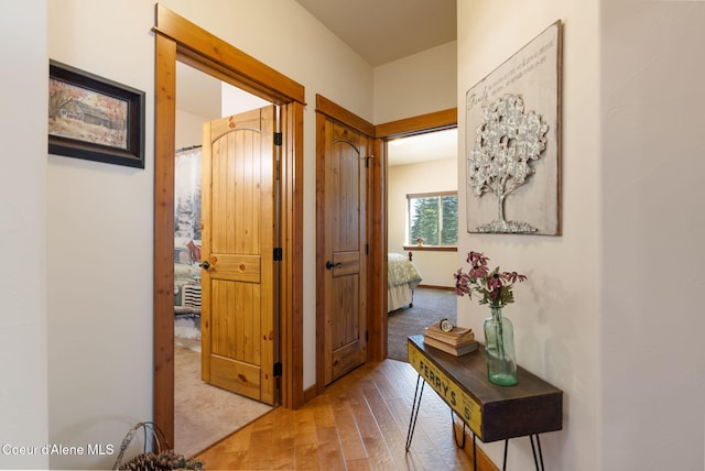 17378 N Freddi Rd, Rathdrum, ID 83858 - hallway with wood finished floors and carpet flooring