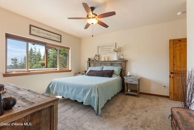 17378 N Freddi Rd, Rathdrum, ID 83858 - carpeted bedroom with baseboards and ceiling fan