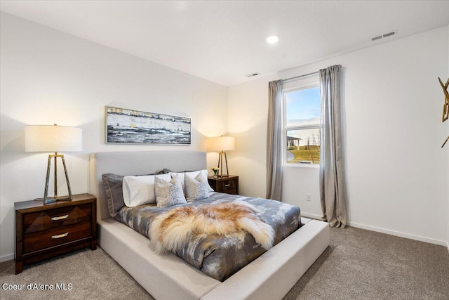 5082 E Norma Ave, Post Falls, ID 83854 - bedroom featuring light colored carpet, baseboards, and recessed lighting