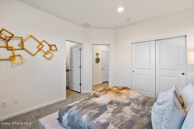 5082 E Norma Ave, Post Falls, ID 83854 - bedroom with carpet flooring, a closet, and baseboards