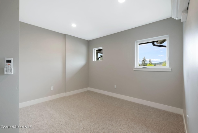1674 Onyx Ct, Sandpoint, ID 83864 - empty room featuring carpet floors, baseboards, and recessed lighting