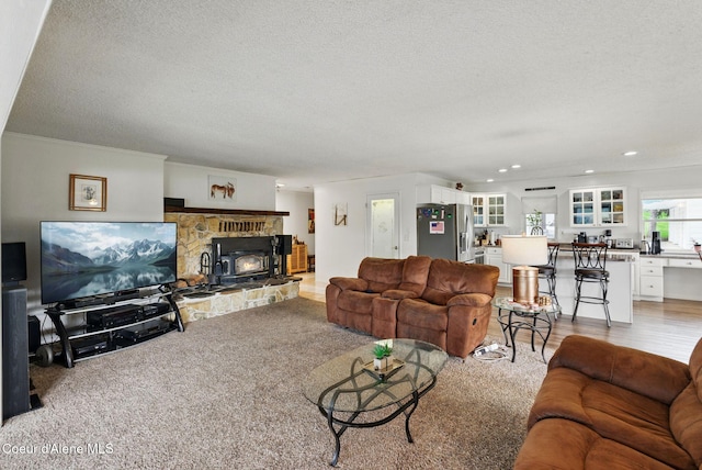 291 Comeback Bay Ln, Sagle, ID 83860 - living area featuring a textured ceiling, recessed lighting, and light carpet