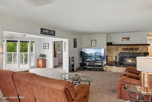 291 Comeback Bay Ln, Sagle, ID 83860 - carpeted living area with a textured ceiling, a wood stove, and crown molding