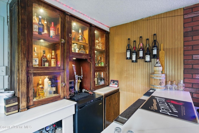 291 Comeback Bay Ln, Sagle, ID 83860 - indoor dry bar with a textured ceiling and wood walls