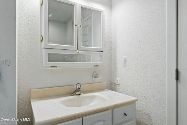 291 Comeback Bay Ln, Sagle, ID 83860 - bathroom with a textured wall and vanity