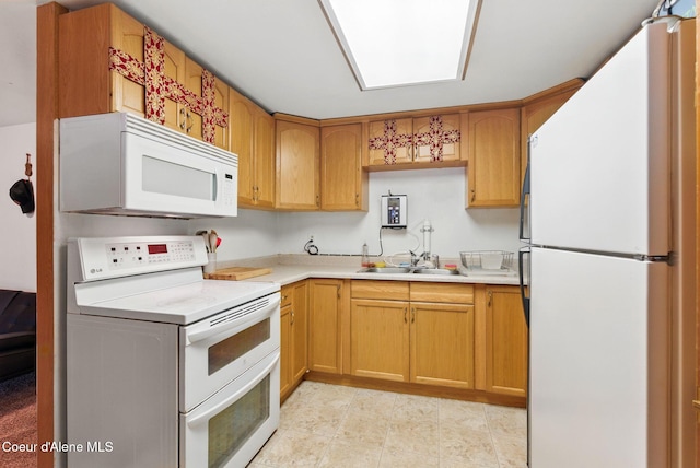 291 Comeback Bay Ln, Sagle, ID 83860 - kitchen featuring white appliances, a sink, and light countertops