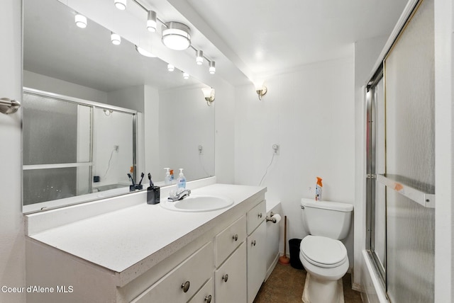 291 Comeback Bay Ln, Sagle, ID 83860 - bathroom featuring toilet, a shower with door, and vanity