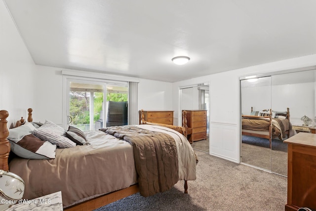 291 Comeback Bay Ln, Sagle, ID 83860 - bedroom with multiple closets, light colored carpet, and access to exterior