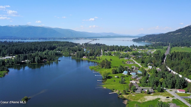 291 Comeback Bay Ln, Sagle, ID 83860 - drone / aerial view of a water and mountain view and a heavily wooded area