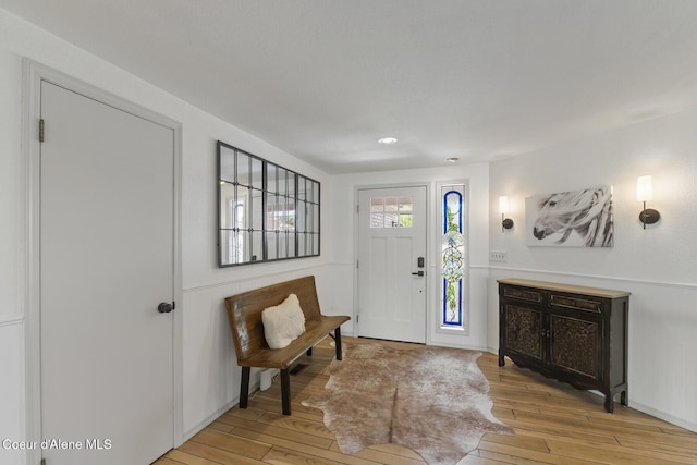7104 W Kidd Island Rd, Coeur Dalene, ID 83814 - foyer featuring light wood-style flooring and recessed lighting