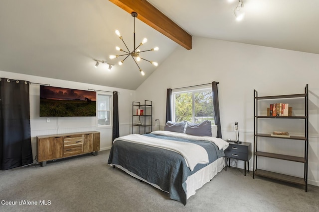7104 W Kidd Island Rd, Coeur Dalene, ID 83814 - bedroom with a chandelier and light colored carpet