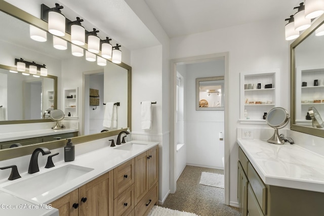 7104 W Kidd Island Rd, Coeur Dalene, ID 83814 - bathroom with double vanity and a bath