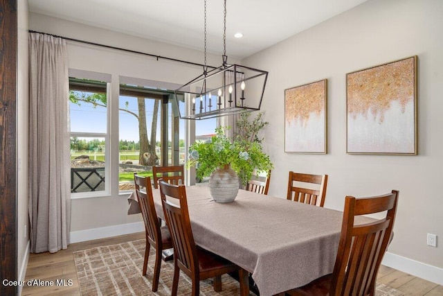 1831 E Dalton Ave, Dalton Gardens, ID 83815 - dining space featuring a chandelier, baseboards, wood finished floors, and recessed lighting