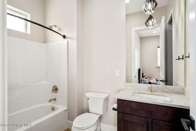 1831 E Dalton Ave, Dalton Gardens, ID 83815 - bathroom with toilet, vanity, washtub / shower combination, and baseboards
