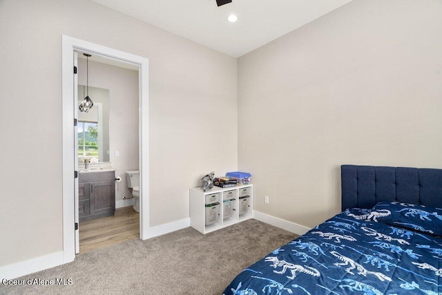 1831 E Dalton Ave, Dalton Gardens, ID 83815 - carpeted bedroom with baseboards and ensuite bathroom