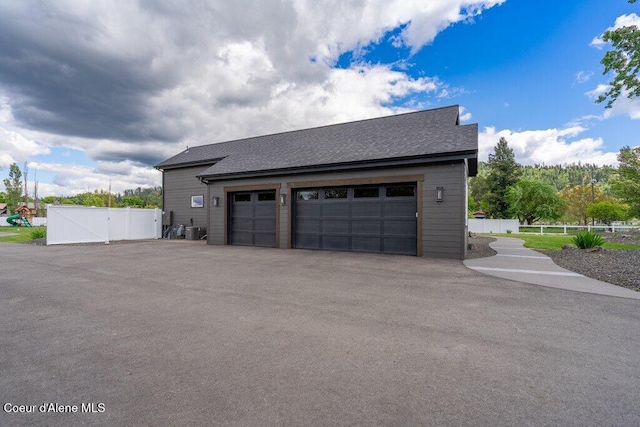 1831 E Dalton Ave, Dalton Gardens, ID 83815 - garage with central air condition unit and a gate