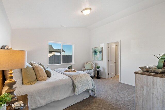13659 N Apex Way, Hayden, ID 83835 - bedroom featuring vaulted ceiling, carpet, and baseboards