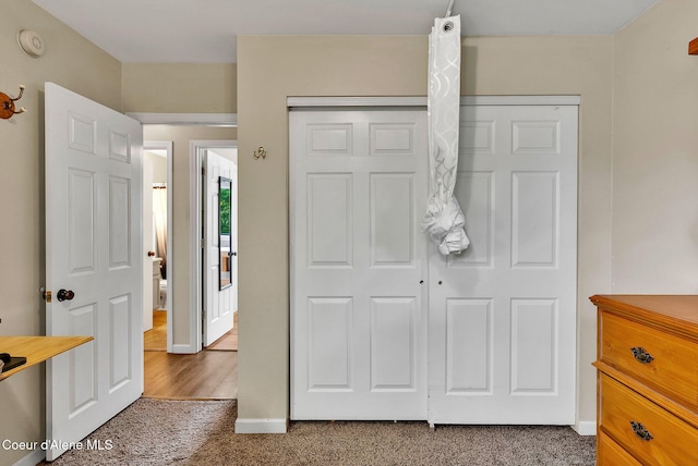 3277 N 10th Pl, Coeur Dalene, ID 83815 - unfurnished bedroom with a closet and dark carpet