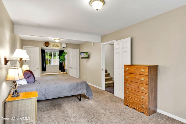 3277 N 10th Pl, Coeur Dalene, ID 83815 - carpeted bedroom featuring baseboards
