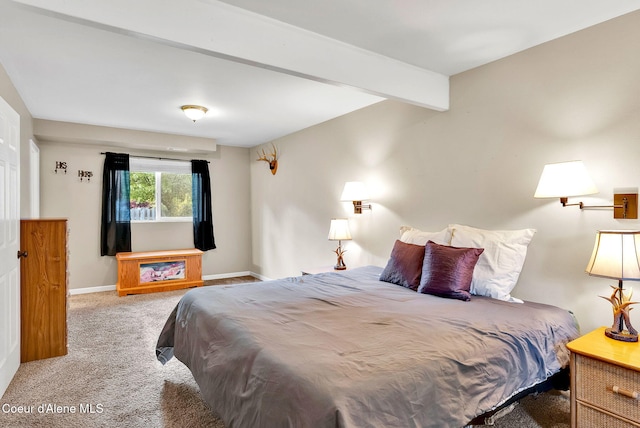 3277 N 10th Pl, Coeur Dalene, ID 83815 - bedroom featuring carpet, baseboards, and beam ceiling