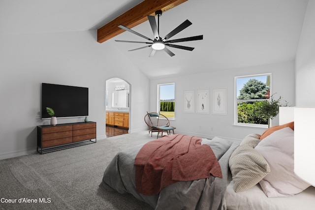 2411 W Diamond Bar Rd, Rathdrum, ID 83858 - carpeted bedroom with arched walkways, ensuite bathroom, and a ceiling fan