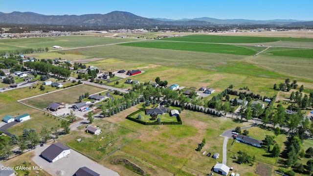 2411 W Diamond Bar Rd, Rathdrum, ID 83858 - aerial view of property and surrounding area with a mountainous background