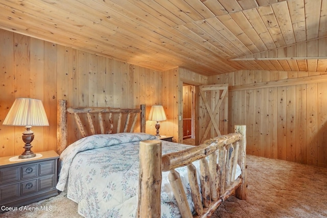 1180 Mountain View Rd, Clark Fork, ID 83811 - bedroom with wooden ceiling, carpet, and wooden walls