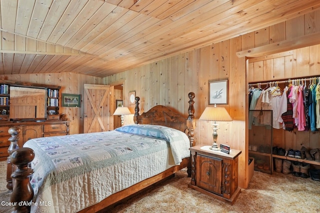 1180 Mountain View Rd, Clark Fork, ID 83811 - bedroom featuring carpet flooring, wood ceiling, wood walls, vaulted ceiling, and a closet