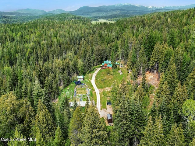 1155 Gold Creek Ridge Rd, Sandpoint, ID 83864 - drone / aerial view of a heavily wooded area and mountains