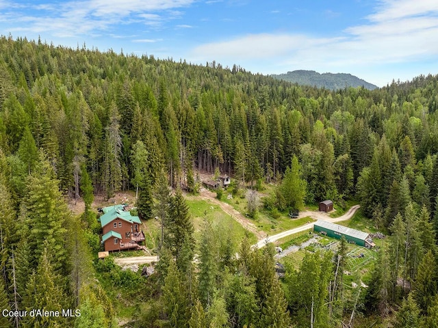 1155 Gold Creek Ridge Rd, Sandpoint, ID 83864 - aerial view of a heavily wooded area and a mountainous background