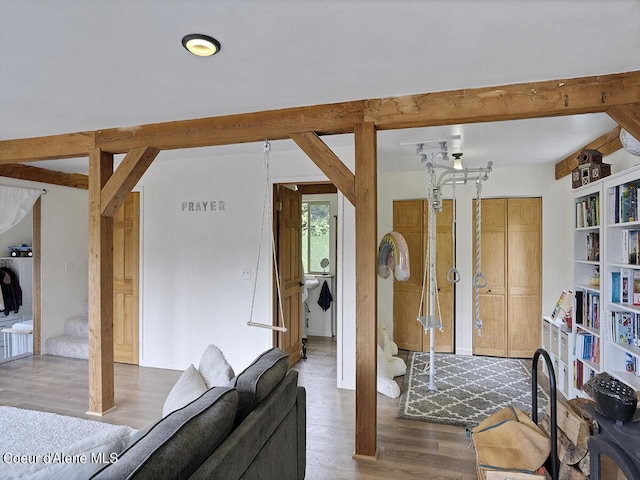 1155 Gold Creek Ridge Rd, Sandpoint, ID 83864 - living area featuring beamed ceiling and wood finished floors