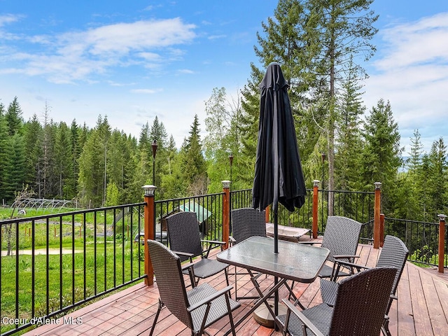1155 Gold Creek Ridge Rd, Sandpoint, ID 83864 - deck with outdoor dining area