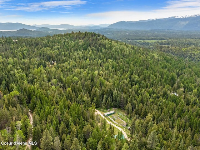 1155 Gold Creek Ridge Rd, Sandpoint, ID 83864 - bird's eye view of a heavily wooded area and a mountainous background