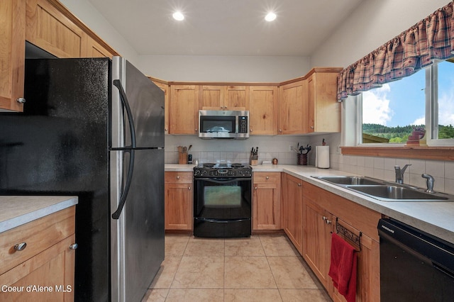 49-C Chardonnay Dr, Blanchard, ID 83804 - kitchen with black appliances, a sink, tasteful backsplash, light countertops, and recessed lighting