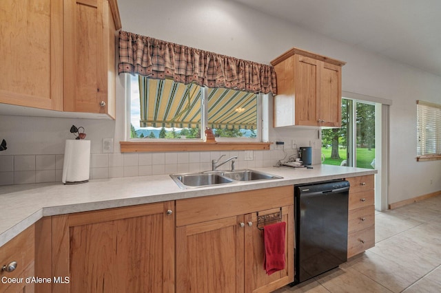 49-C Chardonnay Dr, Blanchard, ID 83804 - kitchen with dishwasher, a sink, decorative backsplash, light countertops, and light tile patterned floors