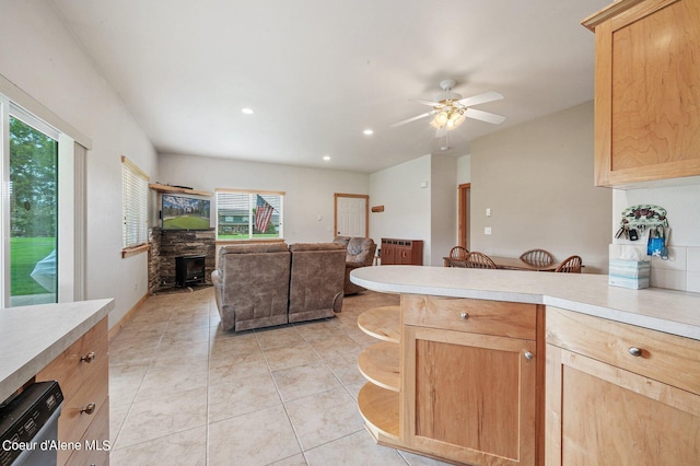 49-C Chardonnay Dr, Blanchard, ID 83804 - kitchen featuring light countertops, open floor plan, a ceiling fan, light brown cabinetry, and light tile patterned floors