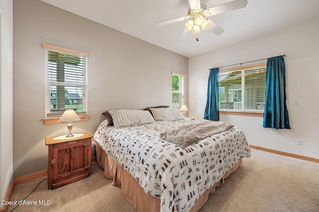 49-C Chardonnay Dr, Blanchard, ID 83804 - bedroom featuring light carpet, baseboards, and a ceiling fan