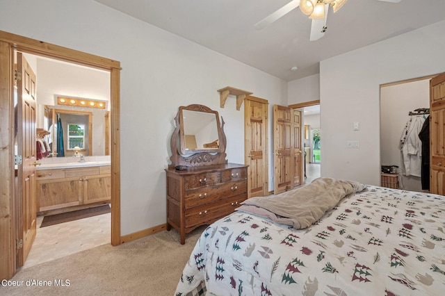 49-C Chardonnay Dr, Blanchard, ID 83804 - bedroom with light carpet, ensuite bath, multiple windows, and baseboards