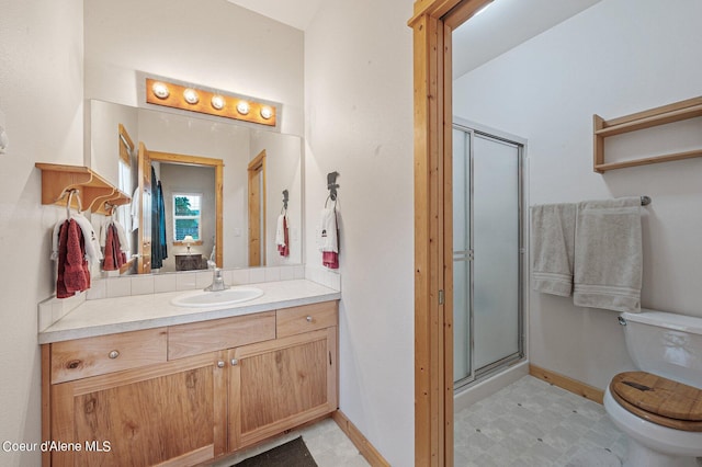 49-C Chardonnay Dr, Blanchard, ID 83804 - full bath featuring toilet, tile patterned floors, a stall shower, and baseboards