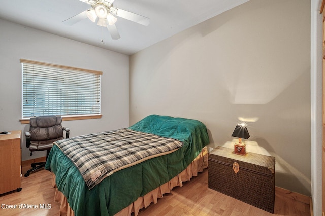 49-C Chardonnay Dr, Blanchard, ID 83804 - bedroom with light wood-type flooring and a ceiling fan