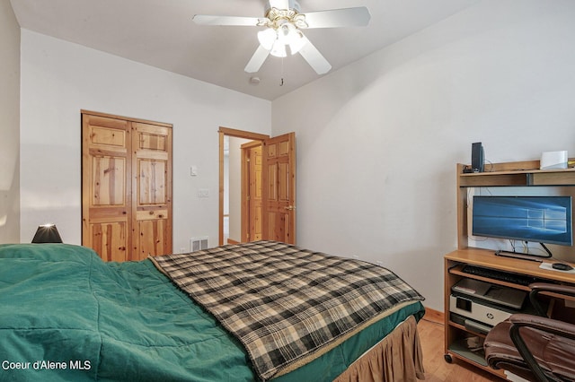 49-C Chardonnay Dr, Blanchard, ID 83804 - bedroom featuring wood finished floors, a desk, and ceiling fan