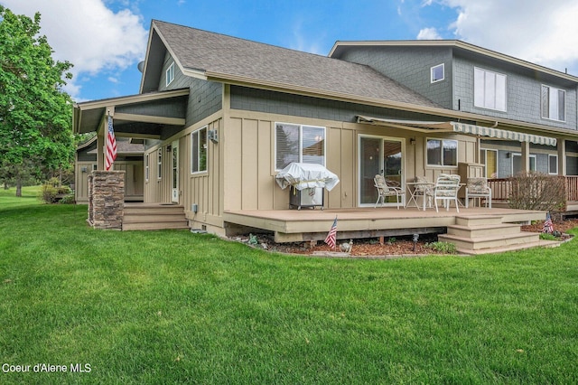 49-C Chardonnay Dr, Blanchard, ID 83804 - back of house featuring a wooden deck, a lawn, a shingled roof, and board and batten siding