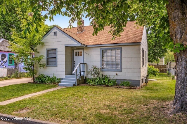 1415 N 2nd St, Coeur Dalene, ID 83814 - bungalow-style house featuring a chimney and roof with shingles