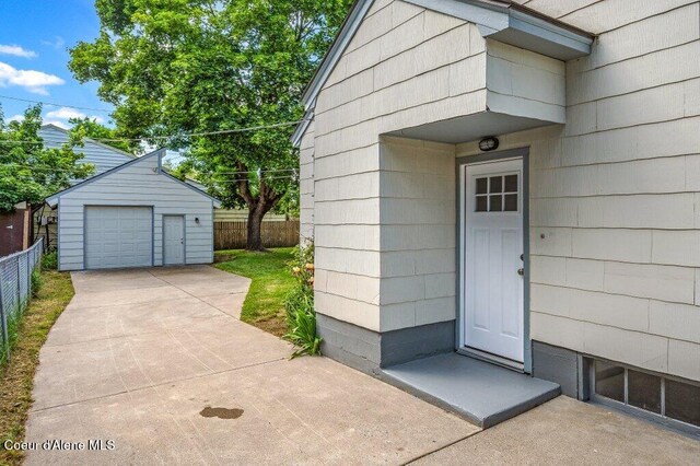 1415 N 2nd St, Coeur Dalene, ID 83814 - view of exterior entry featuring a garage