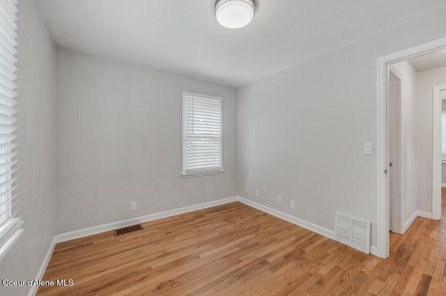 1415 N 2nd St, Coeur Dalene, ID 83814 - spare room with light wood-style flooring and baseboards