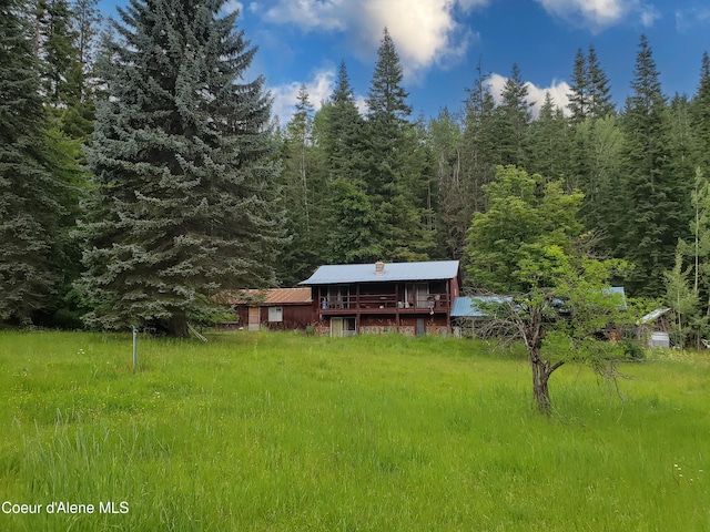 1728 Dry Creek Rd, Clark Fork, ID 83811 - view of yard with a view of trees and a wooden deck