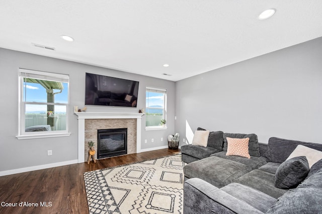 13311 N Loveland Way, Hayden, ID 83835 - living room with healthy amount of natural light, wood finished floors, baseboards, and recessed lighting