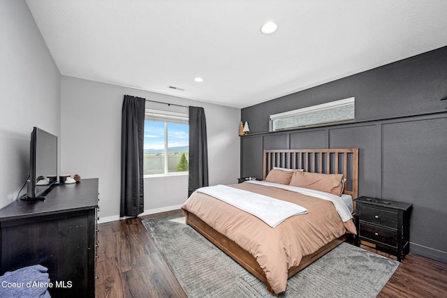 13311 N Loveland Way, Hayden, ID 83835 - bedroom with baseboards, wood finished floors, and recessed lighting