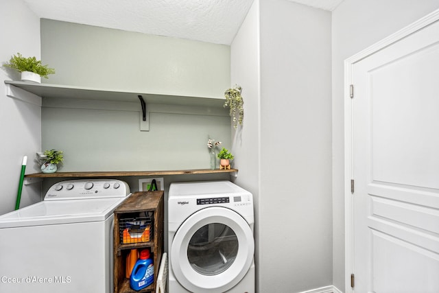 13311 N Loveland Way, Hayden, ID 83835 - washroom featuring washer and dryer and a textured ceiling